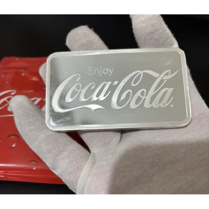 Coca-Cola 10oz 99.9% pure Silver Minted Bar with original packaging.