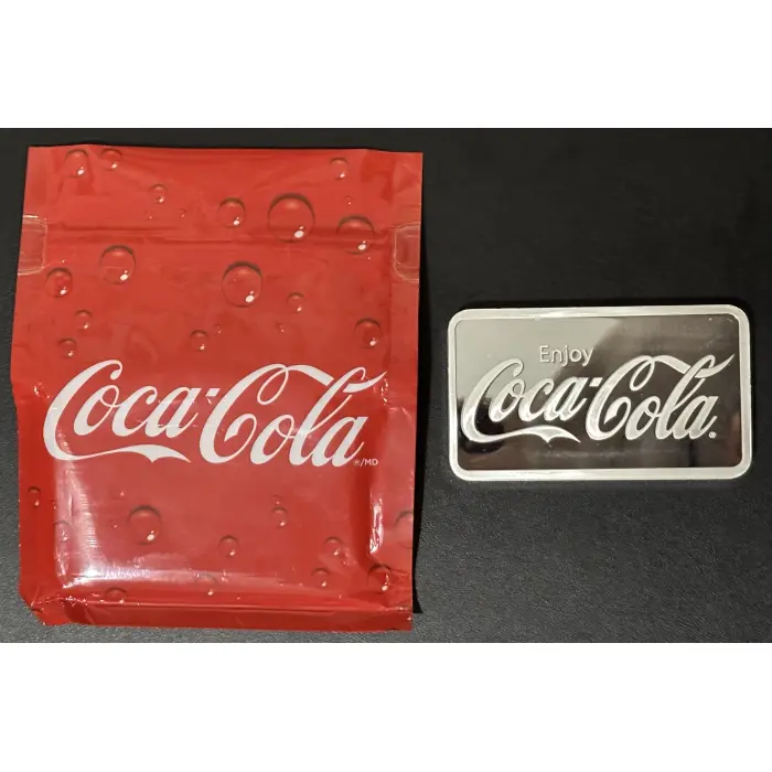 Coca-Cola 10oz 99.9% pure Silver Minted Bar with original packaging.