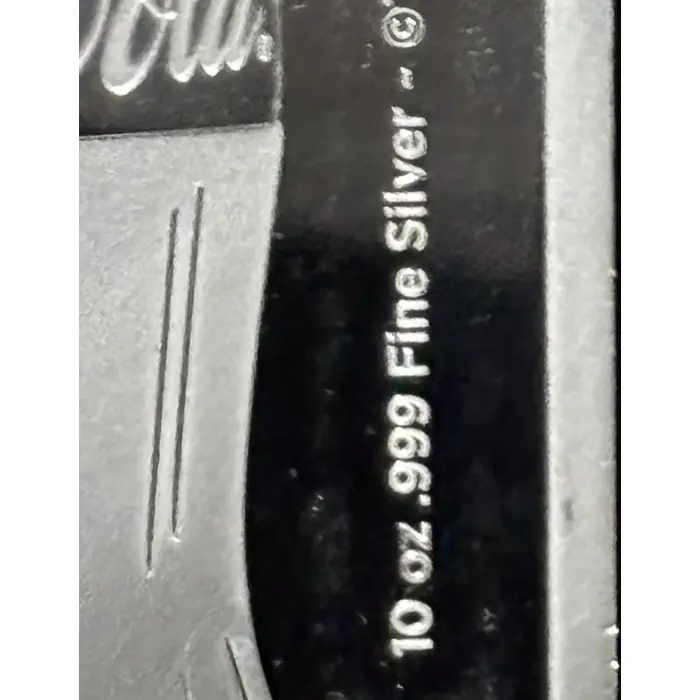 Coca-Cola 10oz 99.9% pure Silver Minted Bar with original packaging.