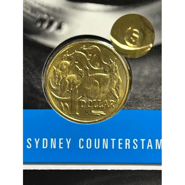 30th Anniversary of the $1 Coin.  2014 $1 “S” Sydney Counterstamp Coin.