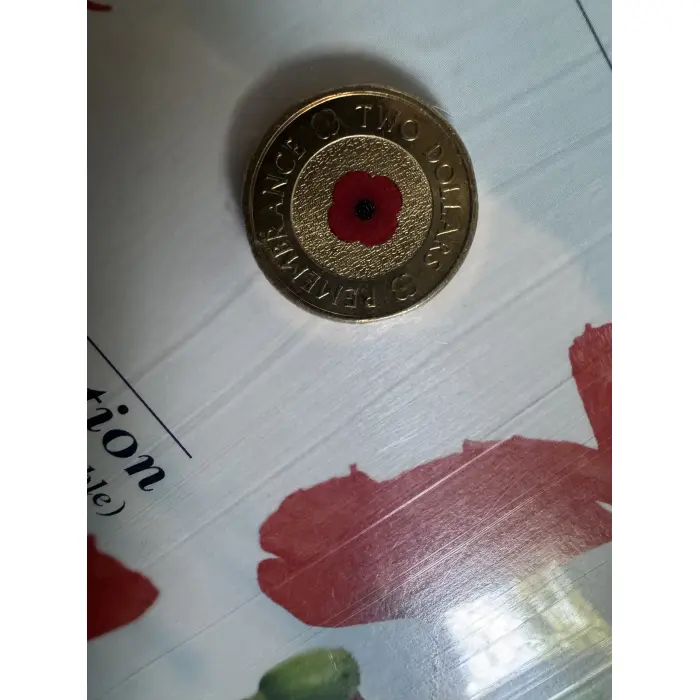 2012 RAM $2 Red Poppy Lest We Forget Uncirculated Coloured Coin on RSL Card.