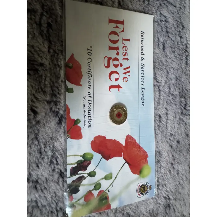 2012 RAM $2 Red Poppy Lest We Forget Uncirculated Coloured Coin on RSL Card.