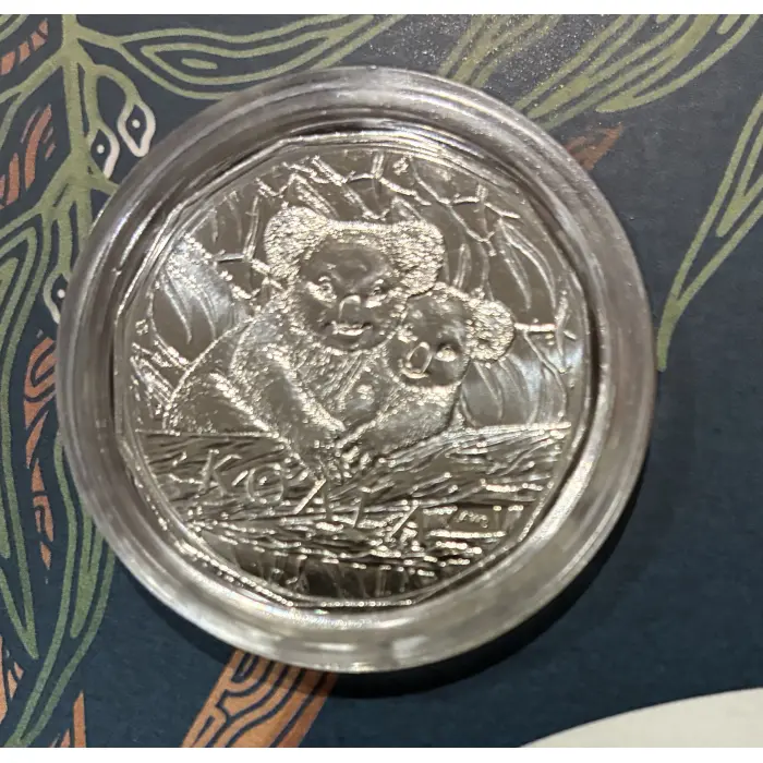 2025 KOALA SERIES -A  MOTHER & BABY KOALA  SITTING ON A BRANCH 50c CARDED COIN 