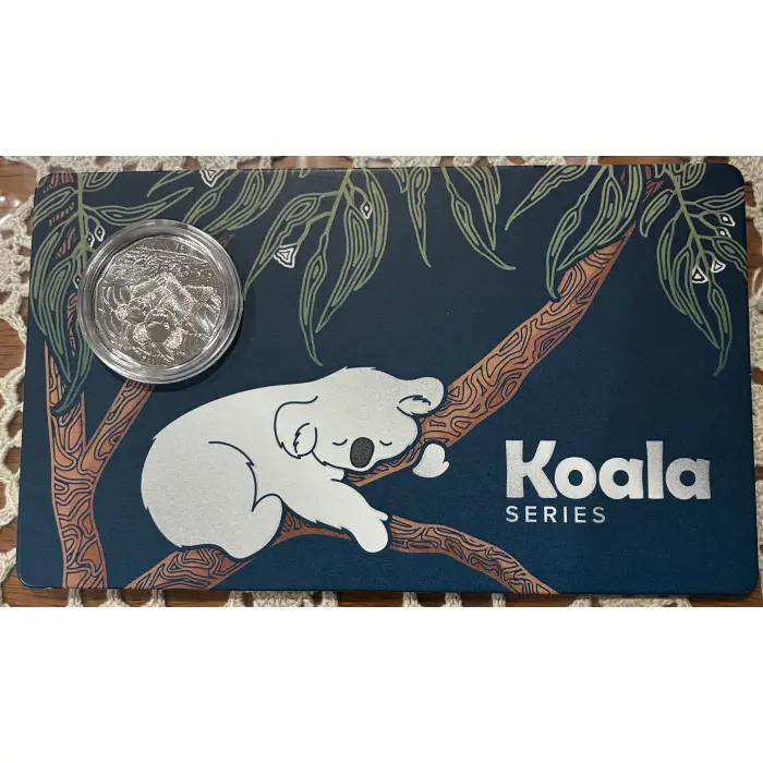 2025 KOALA SERIES -A  MOTHER & BABY KOALA  SITTING ON A BRANCH 50c CARDED COIN 