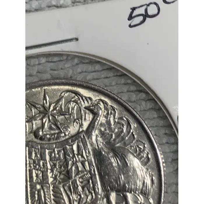 1966 Round 50c Coin with Double Bar