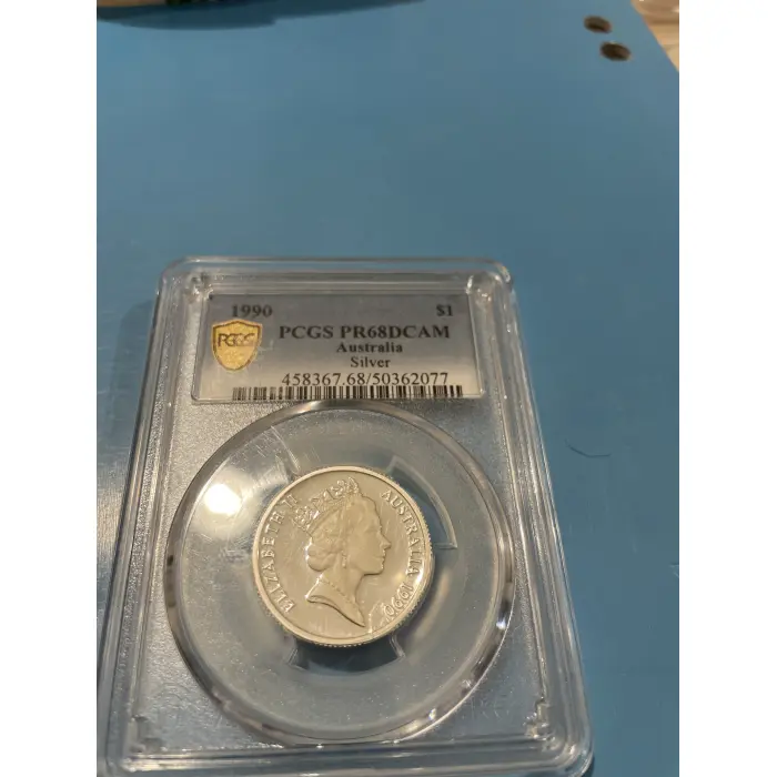 1990 silver proof one dollar coin