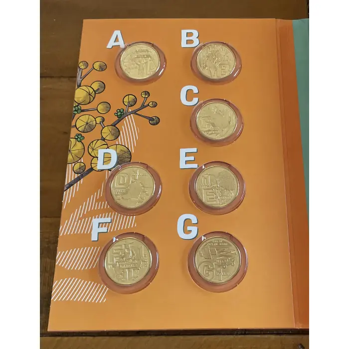 2022 GREAT AUSSIE COIN HUNT 3 - FOLDER 26 $1 COINS - INC. X ‘CRUX’ COLOURED COIN