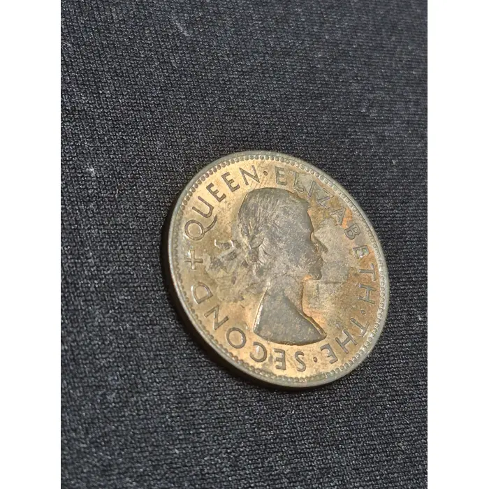 1955 New Zealand One Penny – Moderate Luster & Tōī Bird Design
