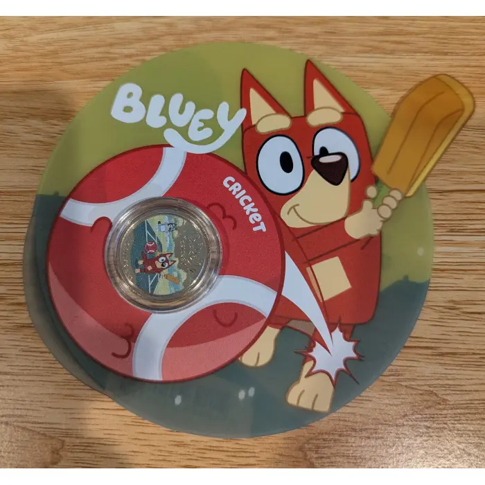 2027 BLUEY CRICKET $1.00 Colour Coin on Card UNC