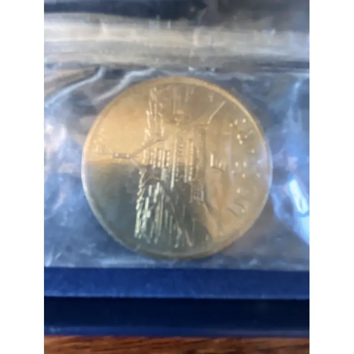 1988 Parliament House $5 coin in its original Commonwealth Bank packaging 